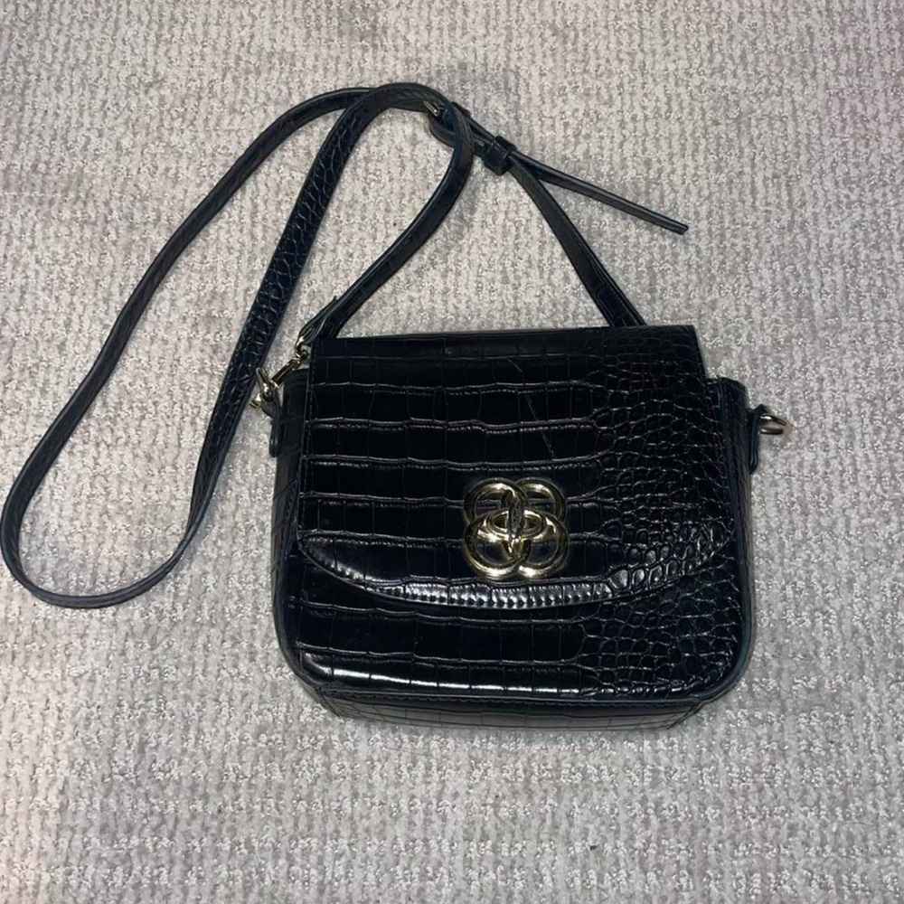 Black and gold Kate Landry bag.